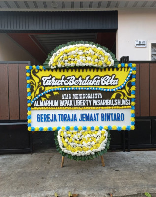 Papan Bunga Duka di Rumoin